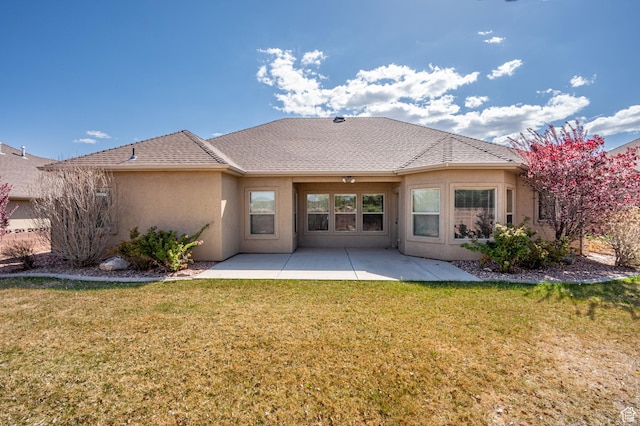 194 S 2875 W, Cedar City, UT 84720 - back of house with a patio, stucco siding, and a yard