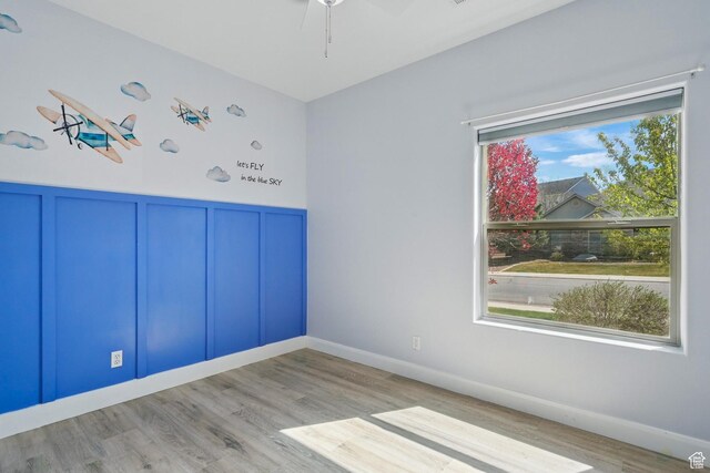 194 S 2875 W, Cedar City, UT 84720 - empty room featuring baseboards, ceiling fan, wood finished floors, and a decorative wall