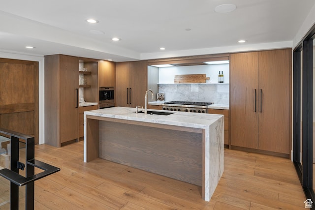 4554 N Forestdale Dr Unit A1, Park City, UT 84098 - kitchen with decorative backsplash, brown cabinetry, open shelves, a sink, and stainless steel appliances