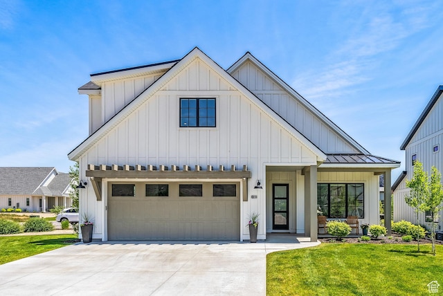 522 N Farmhouse Way, Midway, UT 84049 - modern inspired farmhouse with board and batten siding, a standing seam roof, concrete driveway, and a front lawn