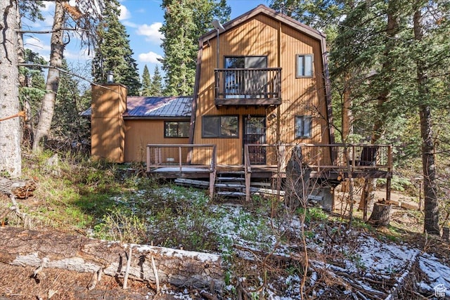 2405 Success Trl Unit 30, Midway, UT 84049 - back of property with a deck, a chimney, metal roof, and a balcony
