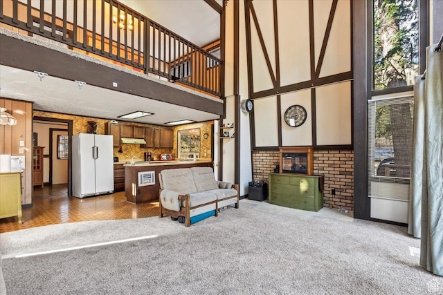 2405 Success Trl Unit 30, Midway, UT 84049 - living area featuring carpet flooring and a towering ceiling