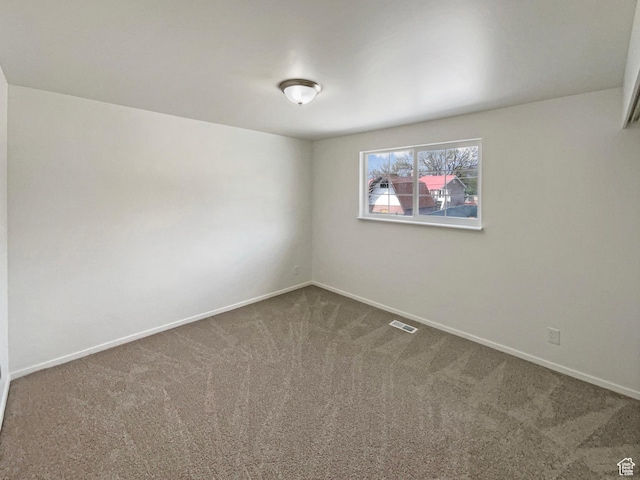 722 E 1300 N, Ogden, UT 84404 - unfurnished room with baseboards, carpet, and visible vents