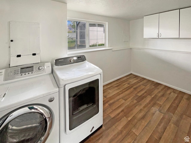 722 E 1300 N, Ogden, UT 84404 - clothes washing area with separate washer and dryer, baseboards, cabinet space, and wood finished floors