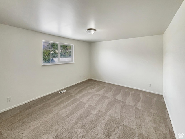722 E 1300 N, Ogden, UT 84404 - unfurnished room featuring carpet floors, baseboards, and visible vents