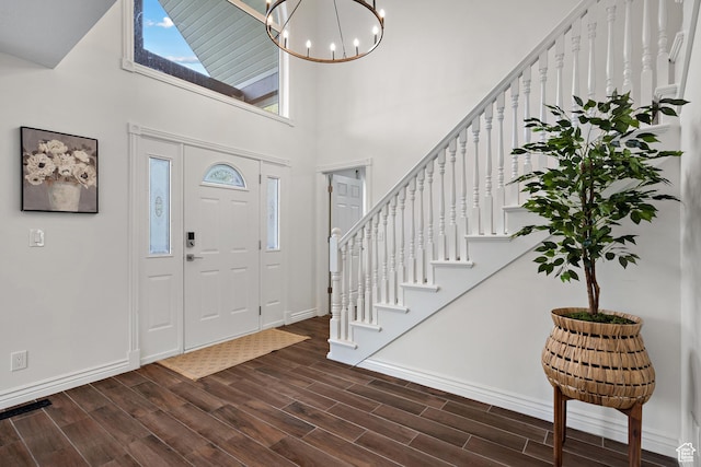 3841 E Grindstone Dr S, Springville, UT 84663 - entryway with baseboards, stairs, dark wood-style flooring, and a high ceiling