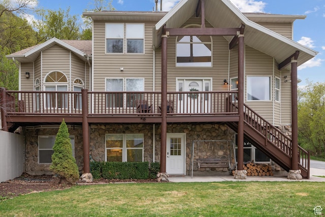 3841 E Grindstone Dr S, Springville, UT 84663 - rear view of property with a wooden deck, a yard, and stone siding
