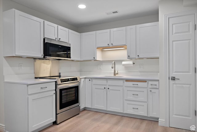 3841 E Grindstone Dr S, Springville, UT 84663 - kitchen featuring light countertops, stainless steel appliances, visible vents, and a sink