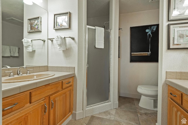 full bath with visible vents, a shower stall, vanity, baseboards, and toilet