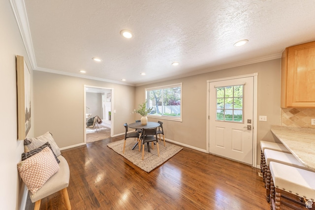 1145 Creek View Dr, Fruit Heights, UT 84037 - dining space with dark wood-style flooring, recessed lighting, crown molding, baseboards, and a textured ceiling