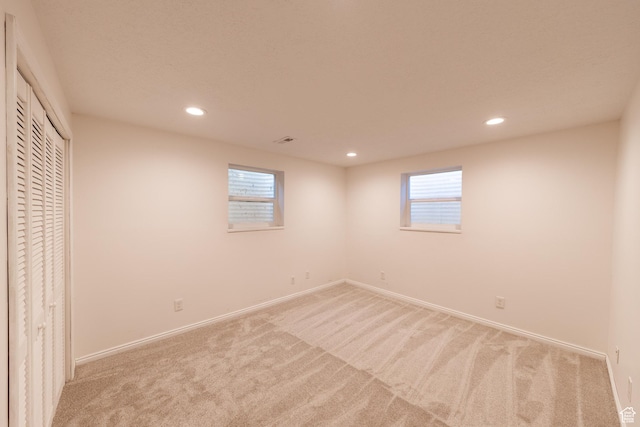 1145 Creek View Dr, Fruit Heights, UT 84037 - unfurnished bedroom with light carpet, recessed lighting, baseboards, and a closet