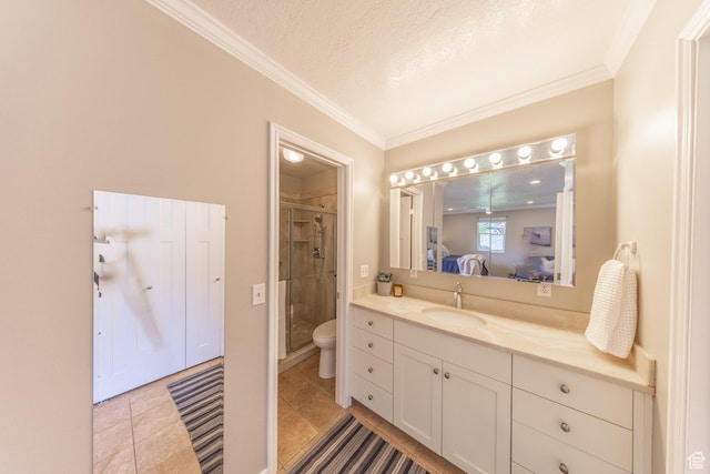 1145 Creek View Dr, Fruit Heights, UT 84037 - ensuite bathroom featuring vanity, a shower stall, toilet, ornamental molding, and tile patterned flooring