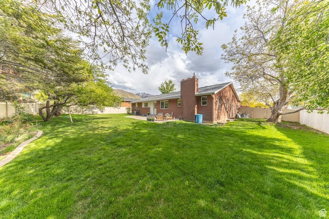 1145 Creek View Dr, Fruit Heights, UT 84037 - view of yard featuring a patio