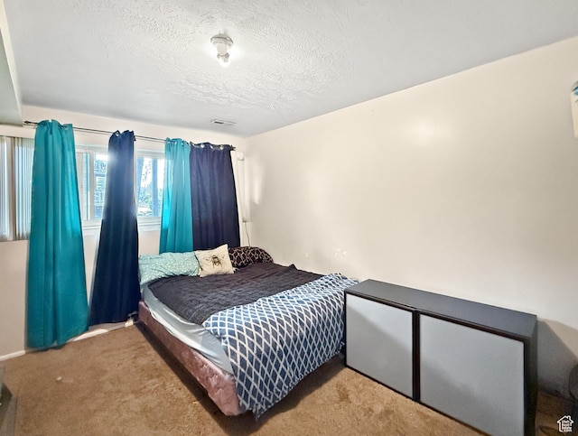 1357 S Lorl Ln # 2, Ogden, UT 84404 - carpeted bedroom featuring a textured ceiling and visible vents