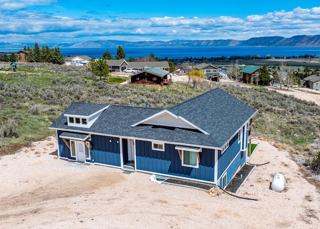 2774 S Chukar Dr, Garden City, UT 84028 - drone / aerial view with a water and mountain view
