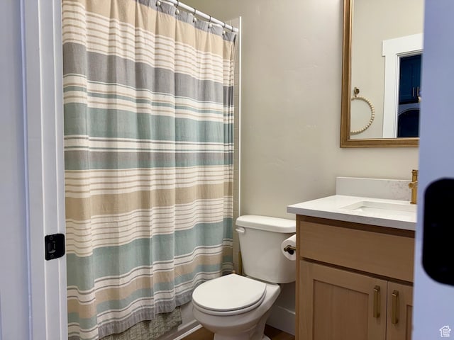 2774 S Chukar Dr, Garden City, UT 84028 - full bath with vanity, toilet, and curtained shower