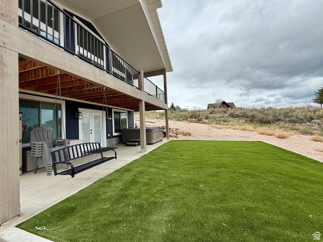 2774 S Chukar Dr, Garden City, UT 84028 - view of yard with french doors, a patio, and a hot tub