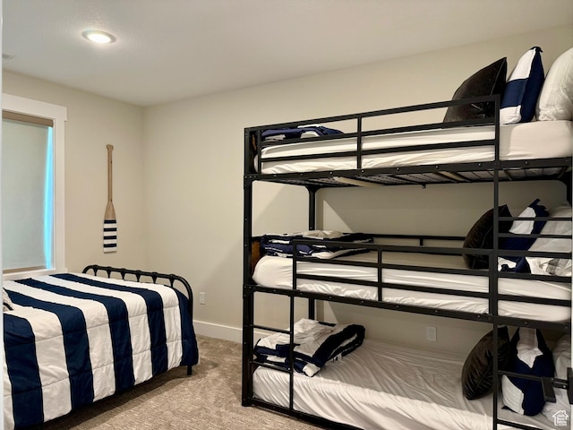 2774 S Chukar Dr, Garden City, UT 84028 - bedroom with carpet flooring and baseboards