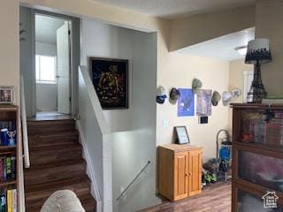 2622 N 175 W, Sunset, UT 84015 - staircase featuring wood finished floors