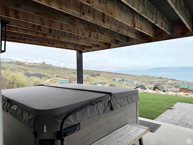660 N Cambry Dr, Garden City, UT 84028 - view of patio / terrace with a water view and a hot tub