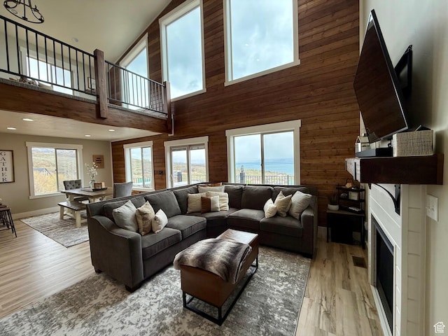 660 N Cambry Dr, Garden City, UT 84028 - living area with a high ceiling, a wealth of natural light, and light wood-type flooring