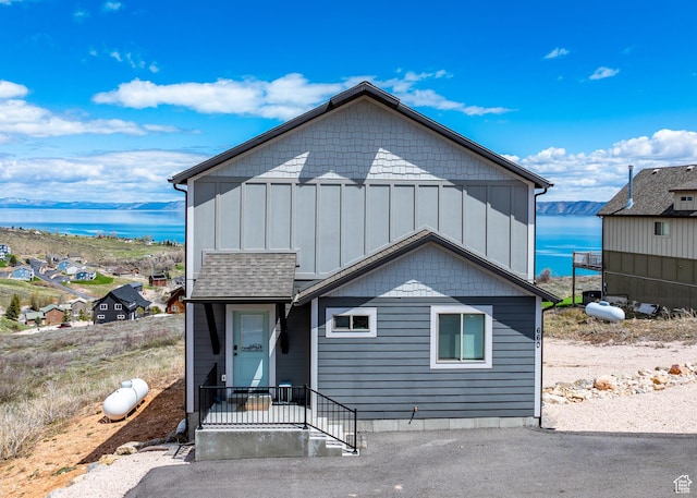 660 N Cambry Dr, Garden City, UT 84028 - view of front of property with a water view and board and batten siding