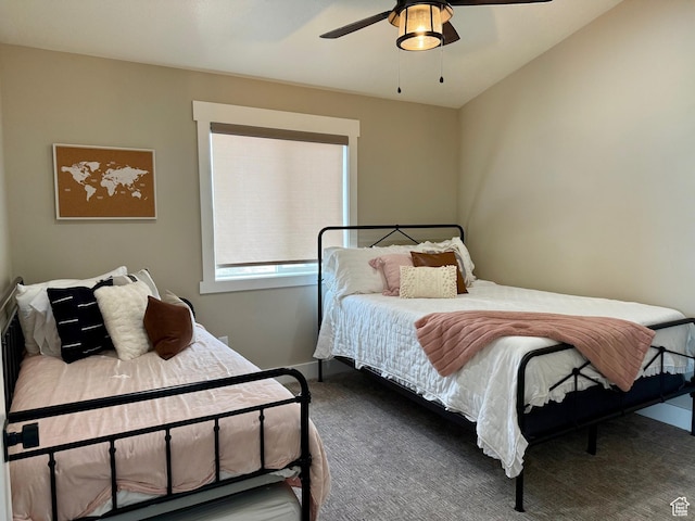 660 N Cambry Dr, Garden City, UT 84028 - carpeted bedroom with a ceiling fan and baseboards