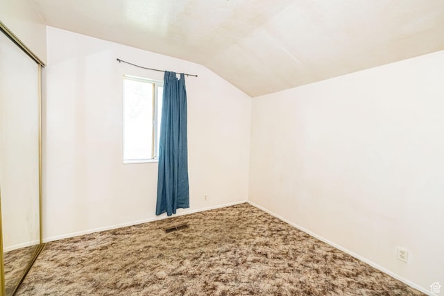 3122 W 1975 N, Plain City, UT 84404 - interior space with baseboards, carpet, vaulted ceiling, and visible vents