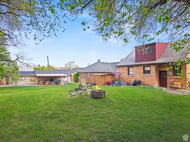 1417 E Binford St, Ogden, UT 84401 - view of yard featuring a fire pit