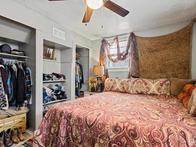 1417 E Binford St, Ogden, UT 84401 - bedroom featuring visible vents, a ceiling fan, and a textured ceiling