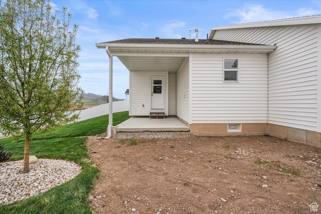 591 S Lakeside Dr, Franklin, ID 83237 - back of house featuring a lawn and fence