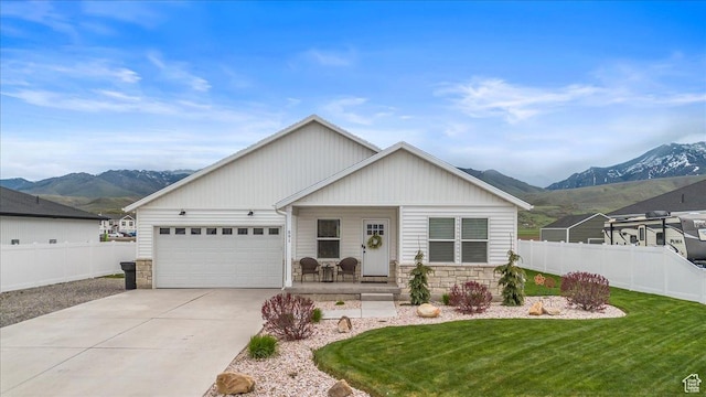 591 S Lakeside Dr, Franklin, ID 83237 - single story home featuring fence, a mountain view, and stone siding