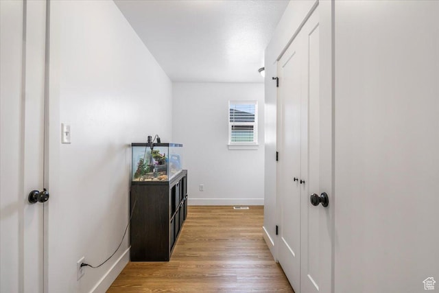 591 S Lakeside Dr, Franklin, ID 83237 - corridor featuring baseboards and light wood-style flooring