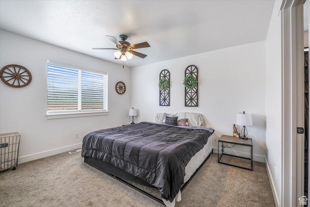 591 S Lakeside Dr, Franklin, ID 83237 - bedroom with carpet flooring, a ceiling fan, and baseboards