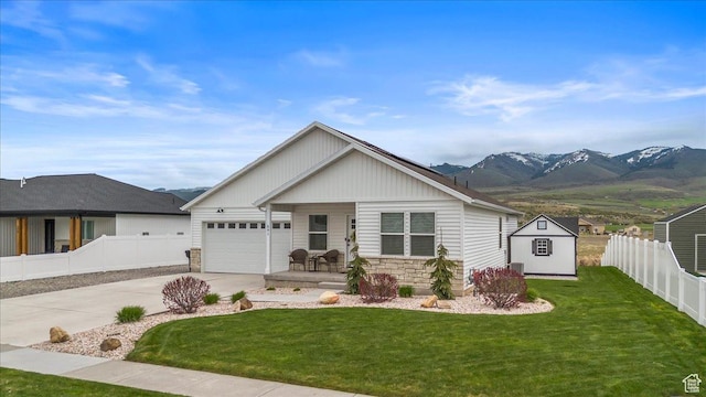 591 S Lakeside Dr, Franklin, ID 83237 - ranch-style home with fence, driveway, and a front yard