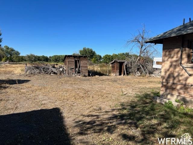 390 W Sandy Ln, Salina, UT 84654 - view of yard featuring an outdoor structure and a shed
