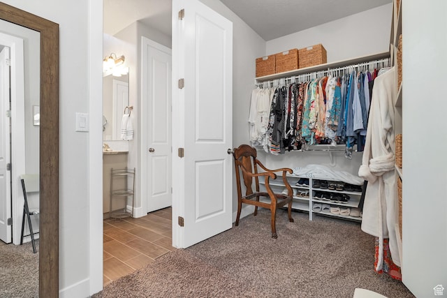 1677 W Escapes Dr Unit 103, St George, UT 84770 - spacious closet featuring wood finished floors