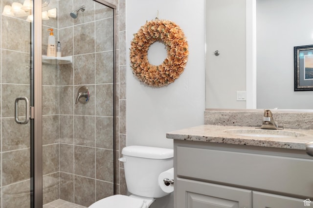 1677 W Escapes Dr Unit 103, St George, UT 84770 - full bathroom featuring toilet, a shower stall, and vanity
