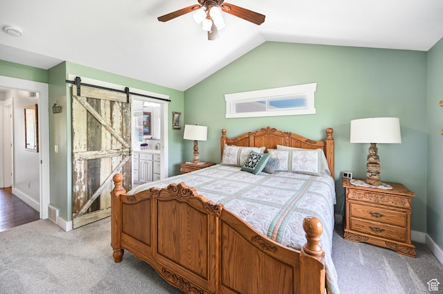 633 N 800 E, Wellsville, UT 84339 - bedroom featuring baseboards, ceiling fan, light colored carpet, a barn door, and vaulted ceiling