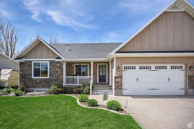 633 N 800 E, Wellsville, UT 84339 - craftsman-style home with covered porch, board and batten siding, driveway, and stone siding