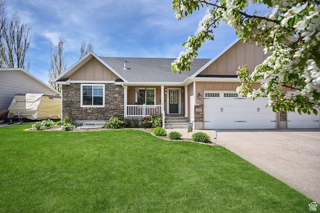 633 N 800 E, Wellsville, UT 84339 - craftsman house with a porch, board and batten siding, stone siding, and concrete driveway