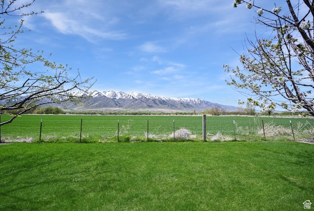 633 N 800 E, Wellsville, UT 84339 - view of yard featuring a rural view, fence, and a mountain view