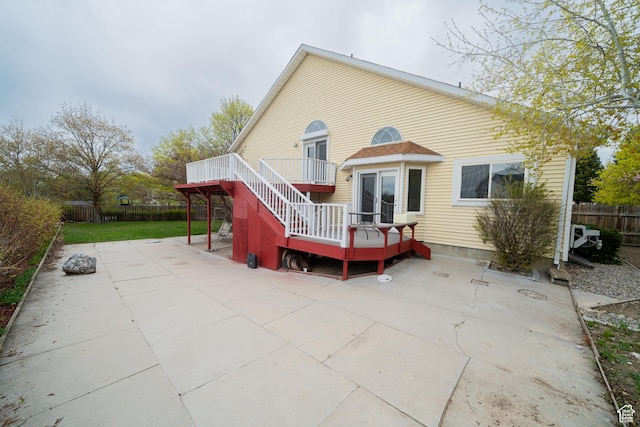 1720 N 1850 E, North Logan, UT 84341 - back of house with stairway, a deck, a fenced backyard, and a patio area
