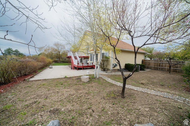 1720 N 1850 E, North Logan, UT 84341 - view of yard featuring a patio area, a wooden deck, and fence