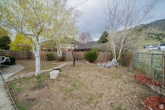 1720 N 1850 E, North Logan, UT 84341 - view of yard with a fenced backyard and a mountain view