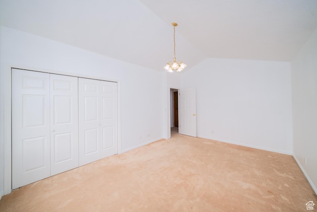 1720 N 1850 E, North Logan, UT 84341 - unfurnished bedroom featuring an inviting chandelier, light carpet, baseboards, lofted ceiling, and a closet