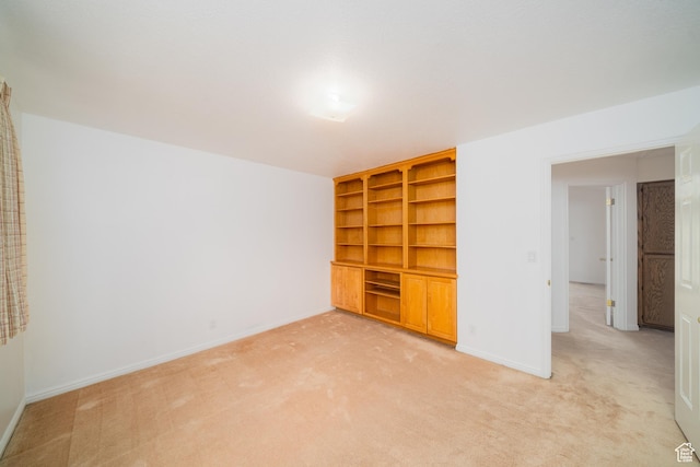 1720 N 1850 E, North Logan, UT 84341 - unfurnished room with baseboards, light colored carpet, and built in shelves