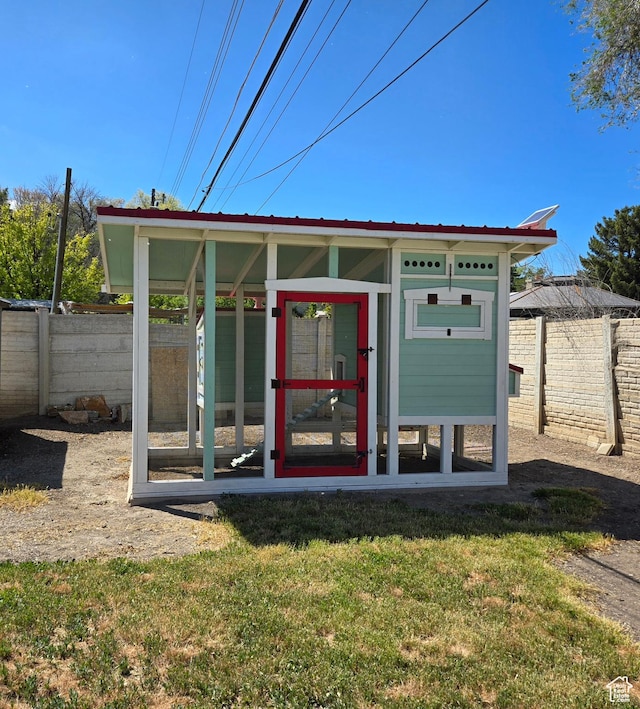 3084 W 3875 S, West Valley City, UT 84119 - view of poultry coop with a lawn and fence private yard
