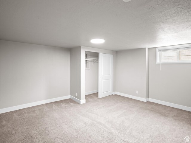 3084 W 3875 S, West Valley City, UT 84119 - basement featuring baseboards, carpet flooring, and a textured ceiling