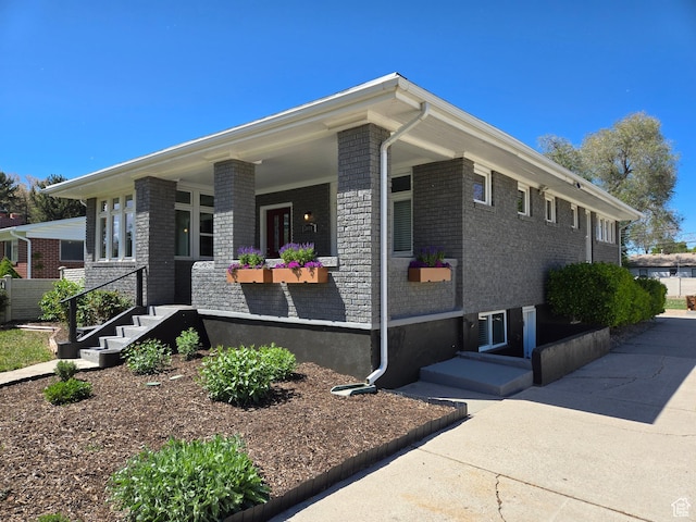 3084 W 3875 S, West Valley City, UT 84119 - view of side of home with a porch and brick siding